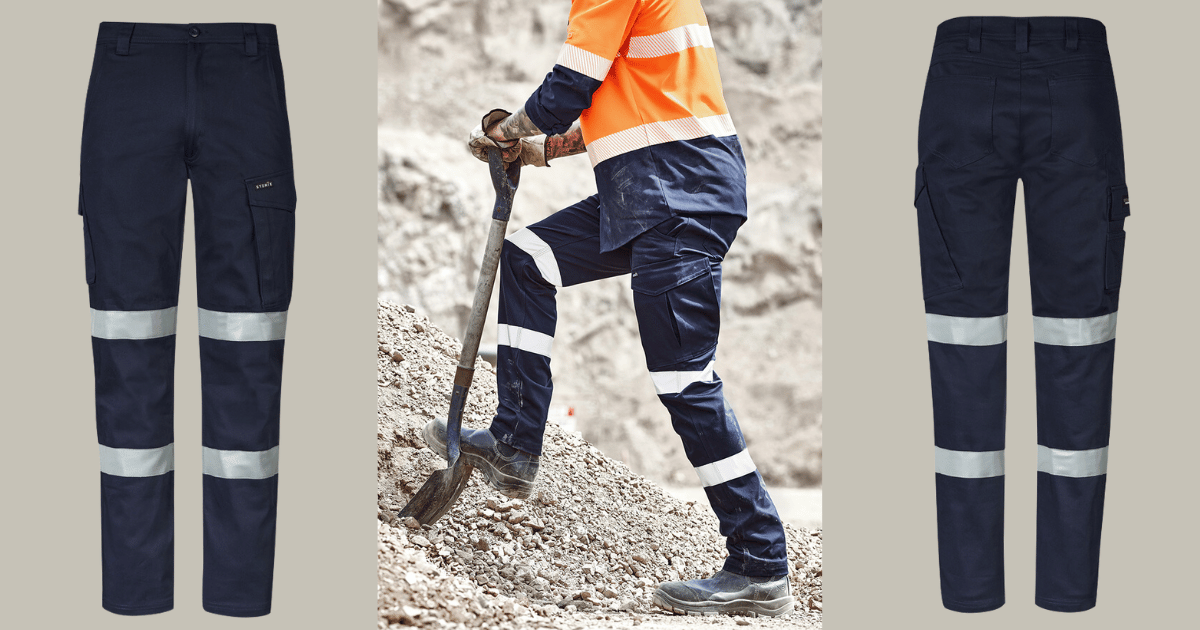 Front view of Syzmik Essential Men's cargo pants. Model using shovel on gravel while wearing Syzmik pants while working outdoors. Back view of Syzmik Essential Men's cargo pants. 